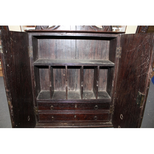 430 - A 19th century cuban mahogany wall cabinet with two internal drawers, pigeon holes and shelf. Height... 