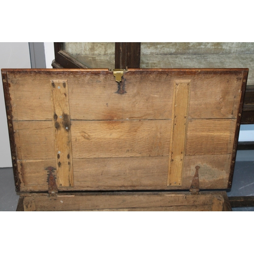 431 - A three plank oak bible box. Height 26cm, width 82cm, depth 49cm.