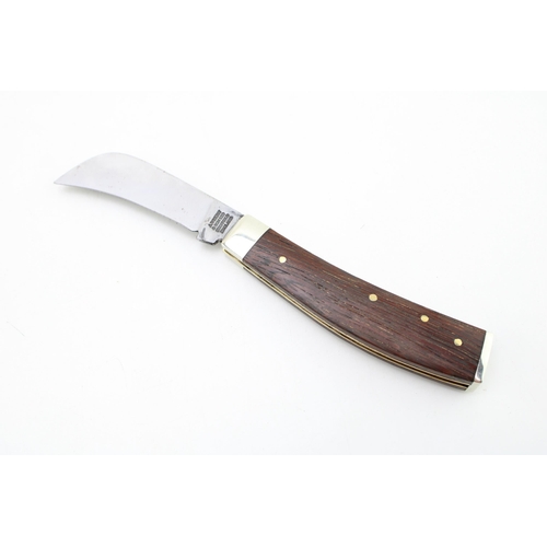 433 - A Wright & Son rosewood handle flat cap pruner pocket knife, Sheffield made. 10.5cm wide, 18cm when ... 