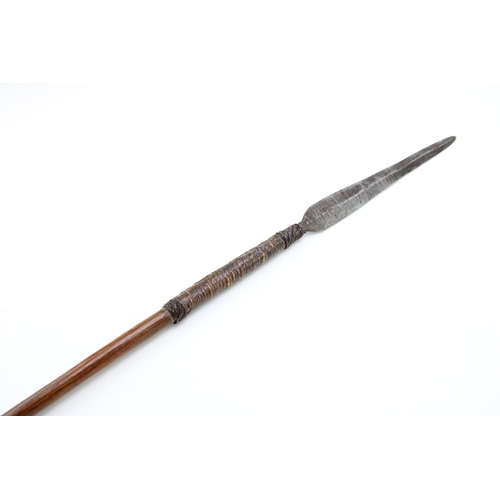 451 - A 19th century African throwing spear, possibly of Iklwa Zulu origin. Bindings in metal and leather.... 