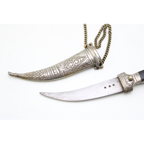 453 - An Eastern Kharijar dagger and scabbard with nickel belt and chains, nickel plated brass handle inse... 