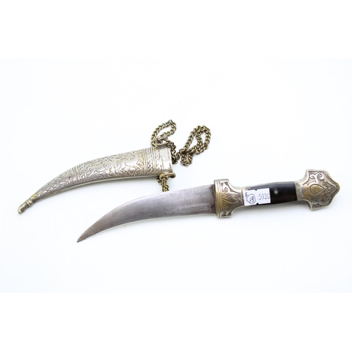 453 - An Eastern Kharijar dagger and scabbard with nickel belt and chains, nickel plated brass handle inse... 