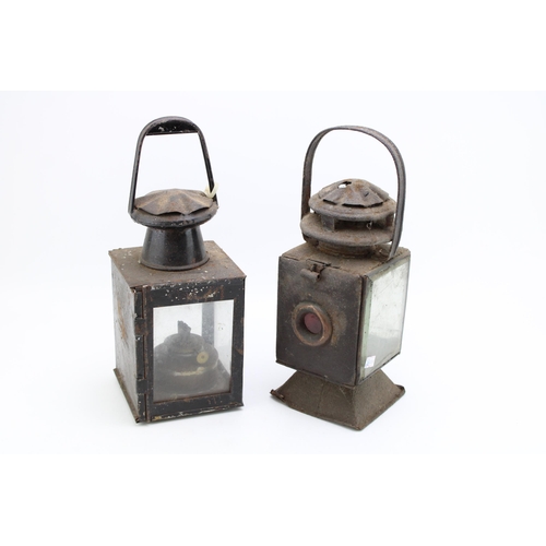 465 - Two vintage railway lamps with oil burners, Height 34cm. (2)