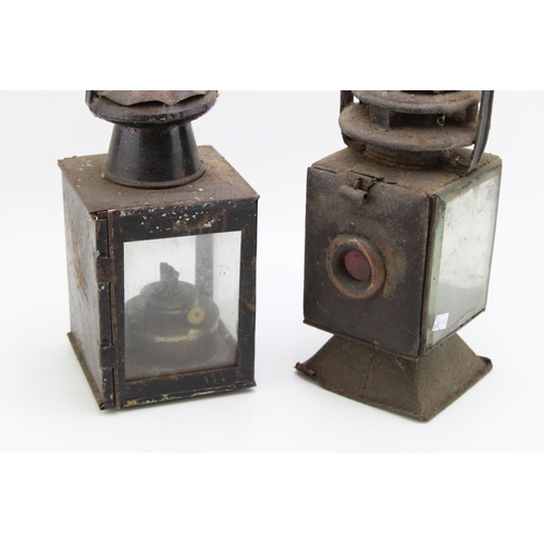 465 - Two vintage railway lamps with oil burners, Height 34cm. (2)