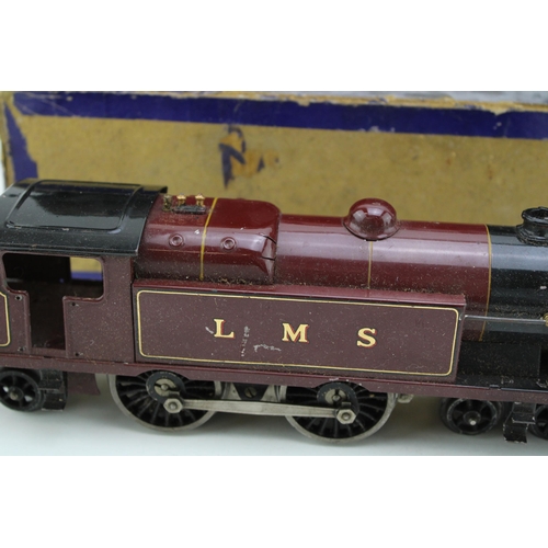 483 - A Hornby O gauge clockwork 4-4-2 2180 LMS locomotive together with tender and carriage. (3)