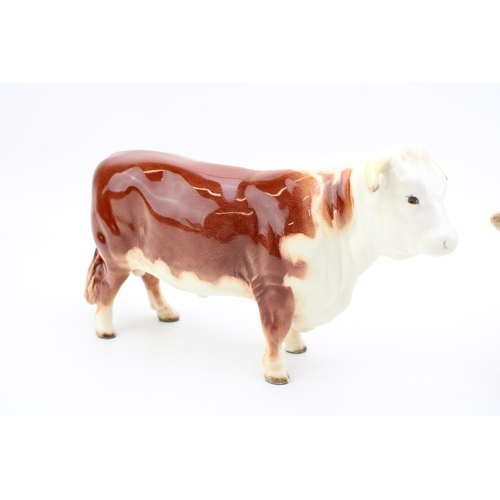 49 - Early Beswick Hereford Bull 949 with early Hereford Cow (horn af) (2).