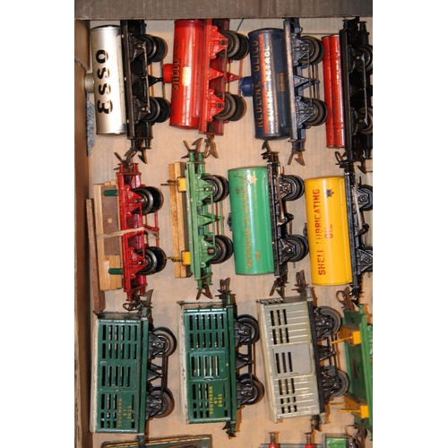 504 - A large collection of O gauge Hornby Trains rolling stock to include, Robert McAlpine side tipping w... 