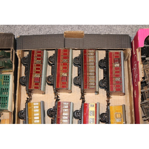 504 - A large collection of O gauge Hornby Trains rolling stock to include, Robert McAlpine side tipping w... 