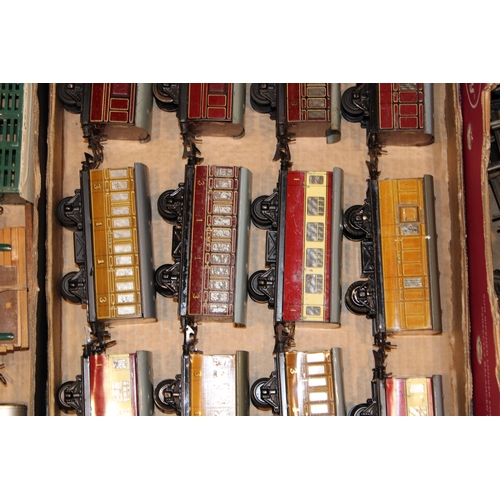 504 - A large collection of O gauge Hornby Trains rolling stock to include, Robert McAlpine side tipping w... 