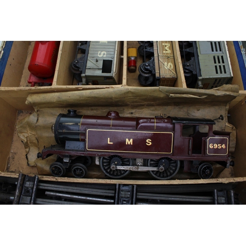 517 - A boxed pre war Hornby O Gauge Electric Train Set, containing: LMS 6954 Locomotive, three LMS wagons... 