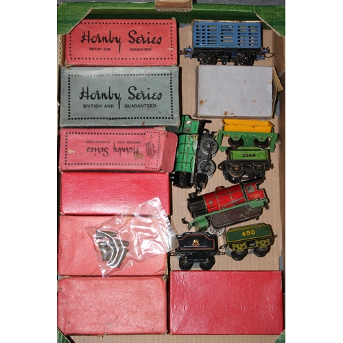 523 - A collection of pre-war O gauge Hornby model railway items to include locos, trucks, accessories and... 