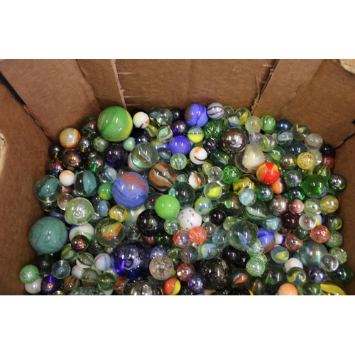 525 - A mixed collection of vintage and antique marbles. (Qty)