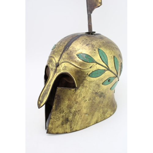 528 - A replica Ancient Greek Spartan helmet. Height 53cm.