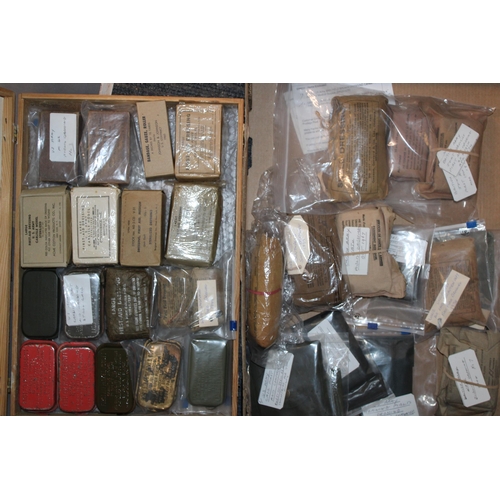 529 - A collection of British and American army first aid kits to include 1942 US Army First Aid Pouch, a ... 