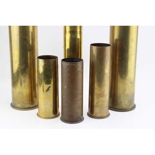 531 - A collection of six WW1 German brass shell casings of various sizes and calibres dated 1916, 1917 an... 