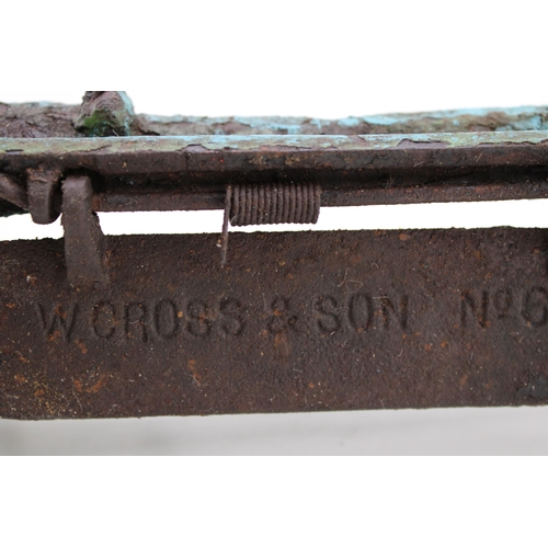 534 - A cast iron letter box with Bat Head design manufactured by W. Cross & Son No 61. Height 25cm. (post... 