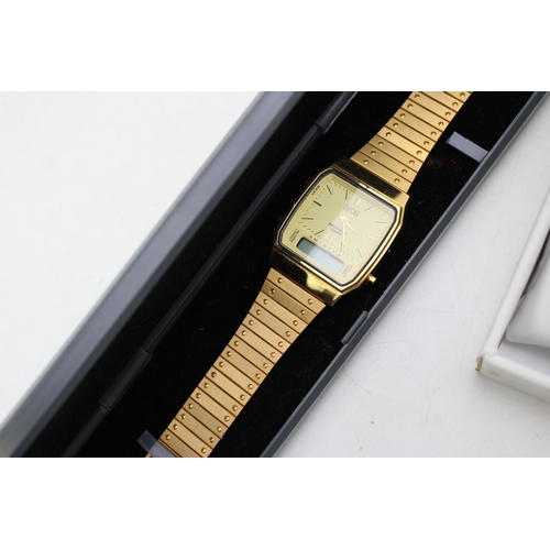 557 - A boxed Accusrist quartz watch, round dial with Roman numerals, together with a boxed gold plated ex... 