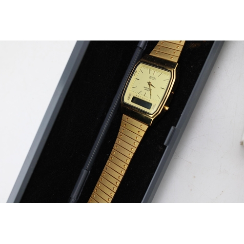 557 - A boxed Accusrist quartz watch, round dial with Roman numerals, together with a boxed gold plated ex... 