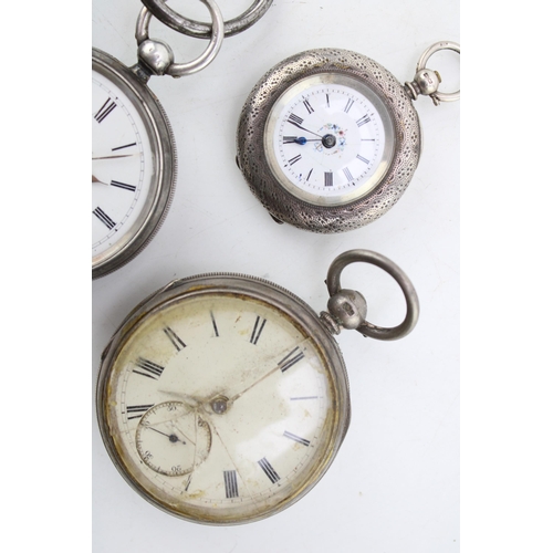 569 - A group of four silver cased pocket watches, including an example by J W Benson of London, and anoth... 