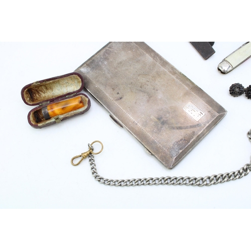 585 - A collection of items to include cased cheroot and cigar holder a/f, silver plated Albert chain and ... 