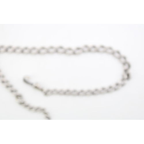 589 - A silver Albert chain, graduated links, Length 37cm. Weight 32.9g