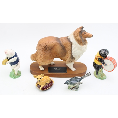 62 - Beswick to include a large Rough Collie on a wooden base, pig band figures Andrew and Michael, a whi... 