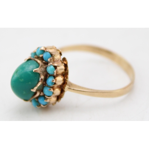 620 - Yellow metal (testing as 9ct gold or better) lady's ring, set turquoise, 2.7g, size N.