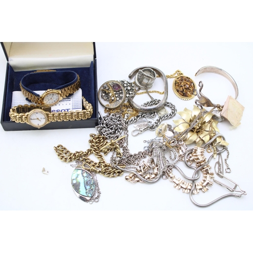 628 - Various items of vintage and later costume jewellery including bangles and brooches, and two watches... 