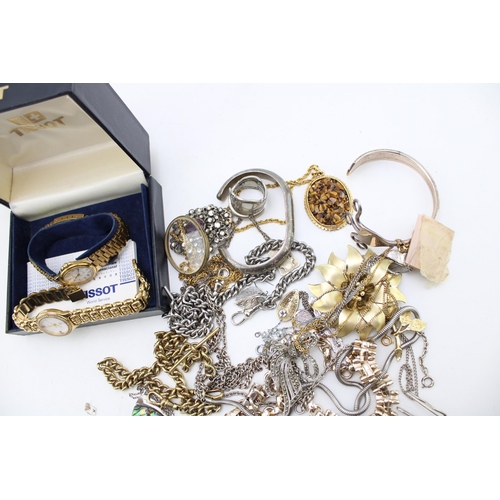 628 - Various items of vintage and later costume jewellery including bangles and brooches, and two watches... 