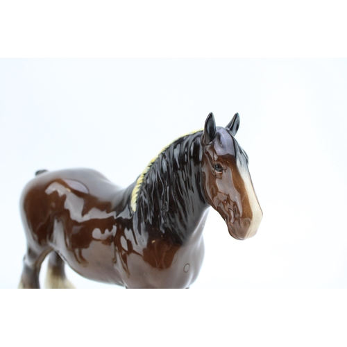 63 - Two Beswick brown shires 818 (1 chipped ear).