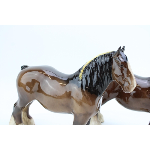 63 - Two Beswick brown shires 818 (1 chipped ear).