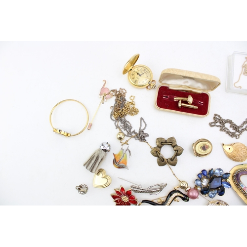 630 - A group of vintage and later costume jewellery, including a silver and enamel boat brooch, a pair of... 