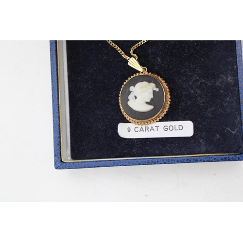 635 - Wedgwood 9ct gold mounted black Jasperware pendant on a 9ct gold chain, combined 5.8g, with a pair o... 