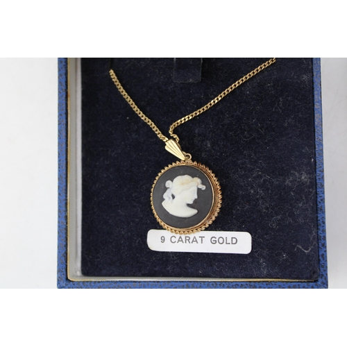 635 - Wedgwood 9ct gold mounted black Jasperware pendant on a 9ct gold chain, combined 5.8g, with a pair o... 