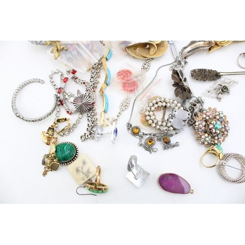 644 - A group of vintage and later costume jewellery including two white metal bangles, likely Indian poss... 