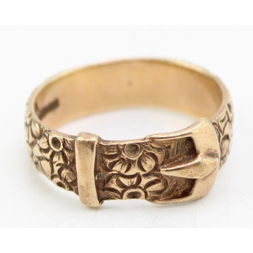 664 - A vintage 9ct gold ring of belt form with foliate engraving, size R, 5.7g.