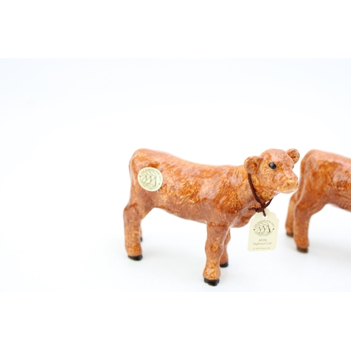 88 - Four Border Fine Arts pottery calf figures of two different breeds (4).