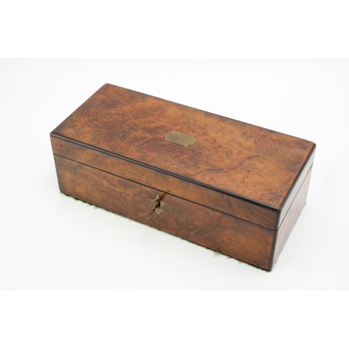 131 - Burr walnut box with brass escutcheons, working key, 25cm x 11cm x 9cm tall.