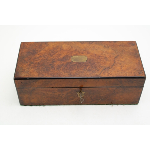 131 - Burr walnut box with brass escutcheons, working key, 25cm x 11cm x 9cm tall.