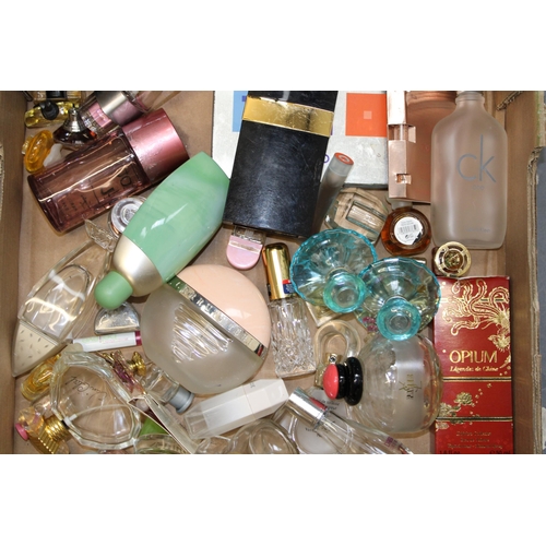 148 - A mixed collection of designer perfumes and perfumes bottles. (Qty)