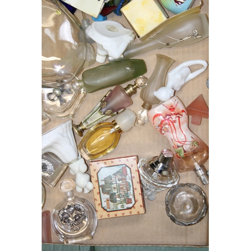 153 - A mixed collection of designer perfumes and perfumes bottles. (Qty)