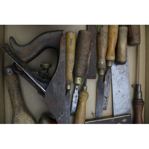 157 - A collection of vintage tools to include a Stanley plane, Sheffield chisels, Chesterman tape measure... 