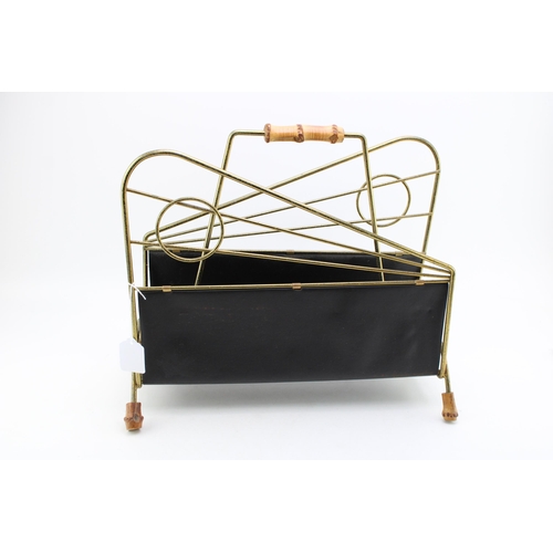 163 - A vintage mid century modern magazine rack with bamboo handle and feet. Height 36cm.