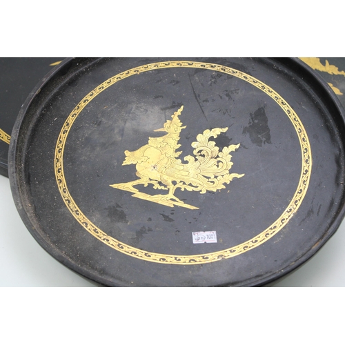 166 - Three vintage graduated Chinese paper mâché trays depicting a stylised cockerel. Diameter 39cm. (3)