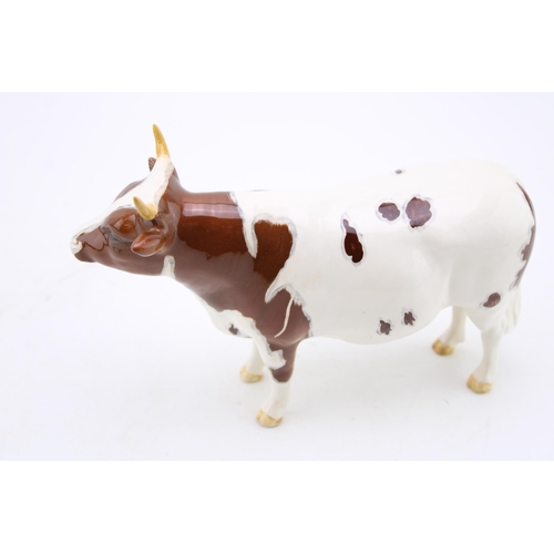 181 - Beswick Ayrshire Bull with a Pigeon (both restored).