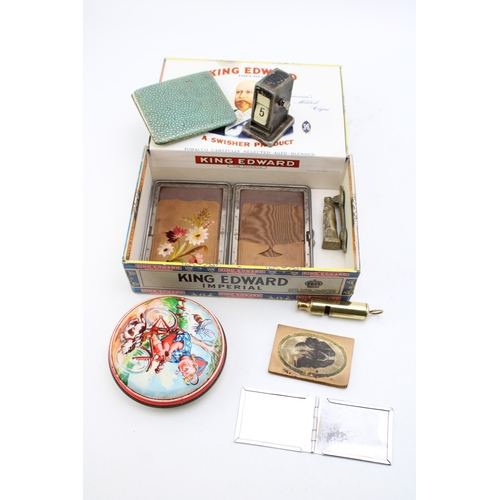 210 - A collection of items to include card case with embroidered interior, French enamelled cigarette cas... 