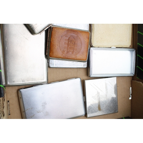 212 - A large collection of vintage cigarette cases include examples in chromium and silver plate. (Qty)