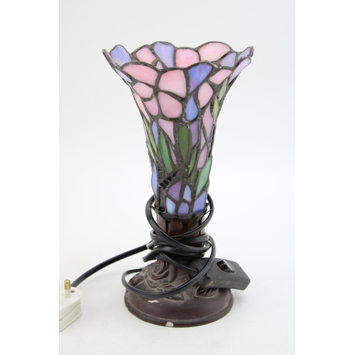 214 - A vintage Liberty Style table lamps with stained glass shade. Height 23cm.