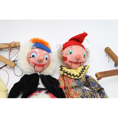 225 - A collection of Pelham Puppets to include Macboozle, Clown and Dutch Boy. (3)