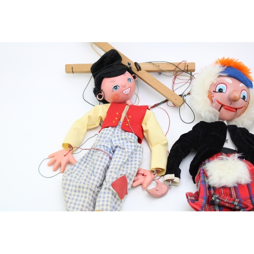 225 - A collection of Pelham Puppets to include Macboozle, Clown and Dutch Boy. (3)